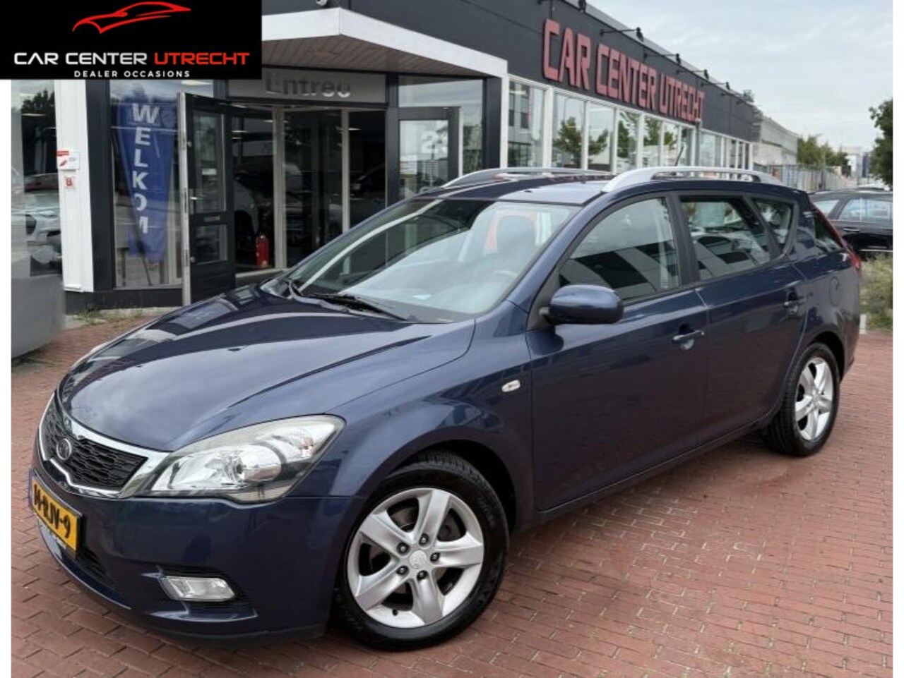 Kia Cee'd Sporty Wagon - 1.4 CVVT Seven navi airco cruise control - AutoWereld.nl