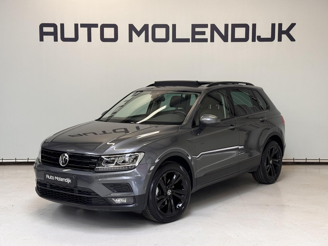 Volkswagen Tiguan - 1.5 TSI Navi / Pano / LED / el. klep / Trekhaak - AutoWereld.nl
