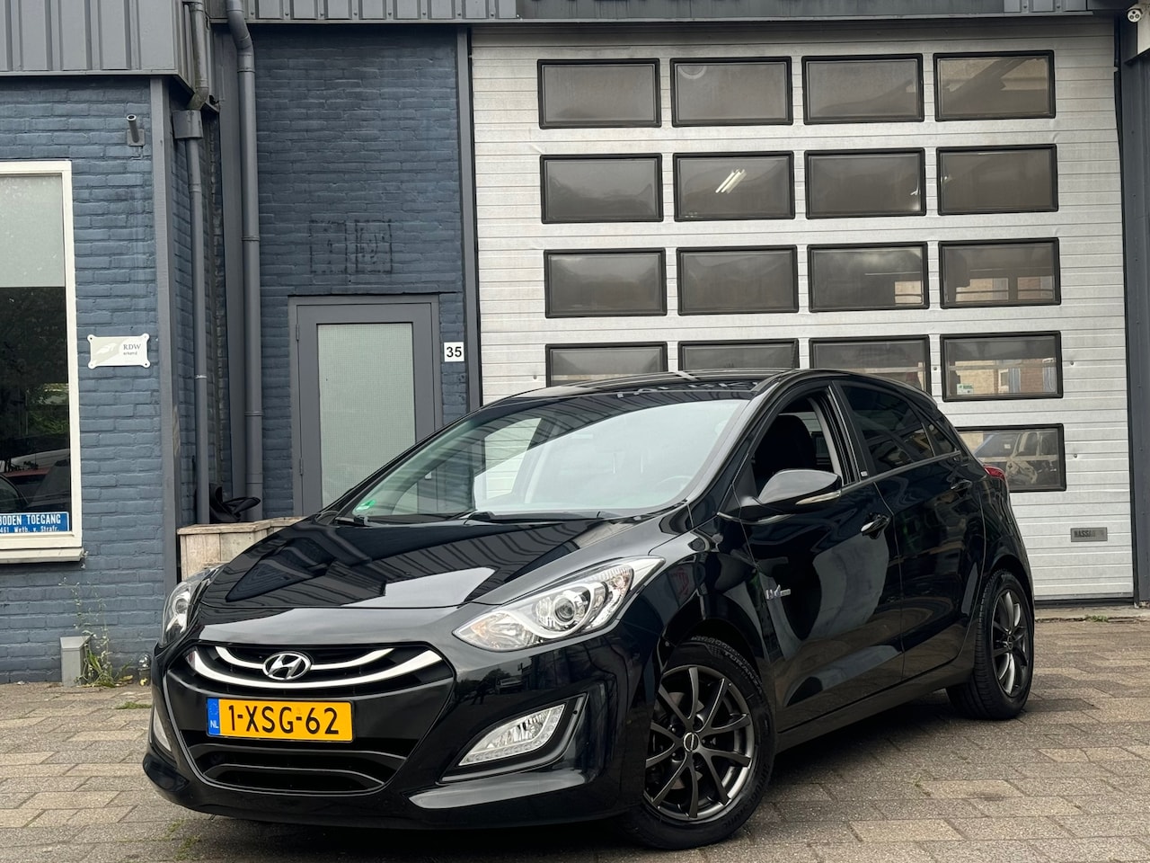 Hyundai i30 - 1.6 GDI Go! | Clima | Cruise | Camera | Navi - AutoWereld.nl