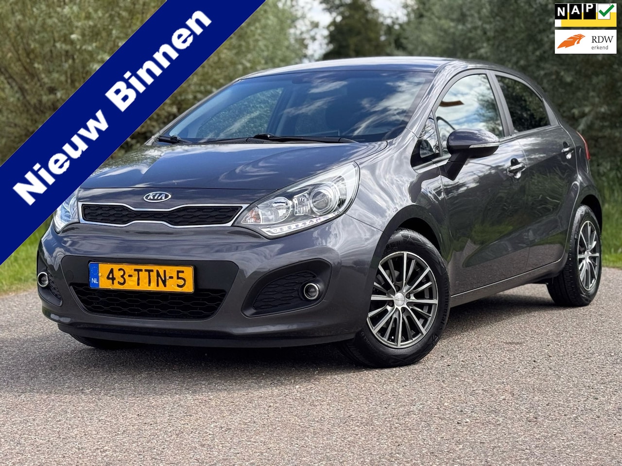 Kia Rio - 1.2 CVVT Super Pack | 1e Eigenaar | Clima | Key-Less | Dealer onderhouden | BT/USB/AUX | P - AutoWereld.nl