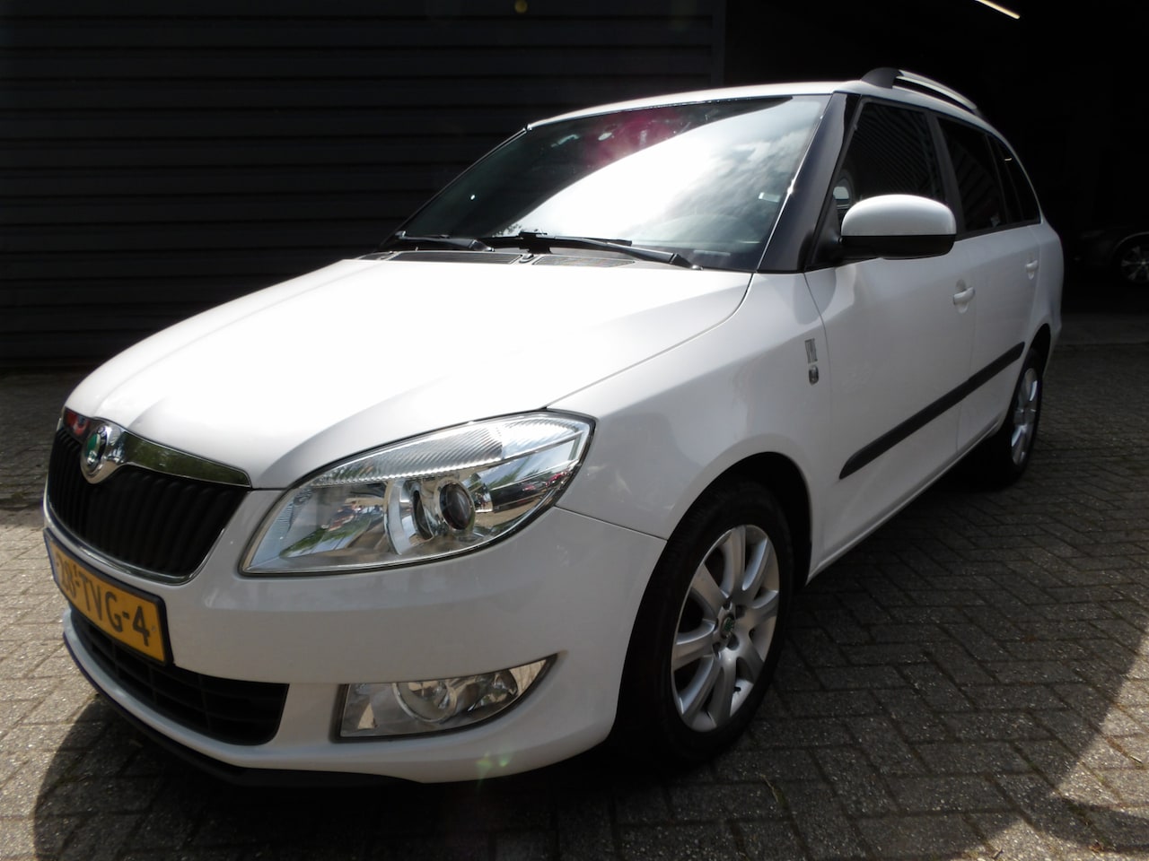Skoda Fabia Combi - 1.2 TSI Style Cruise Airco Trekhaak Nw APK - AutoWereld.nl