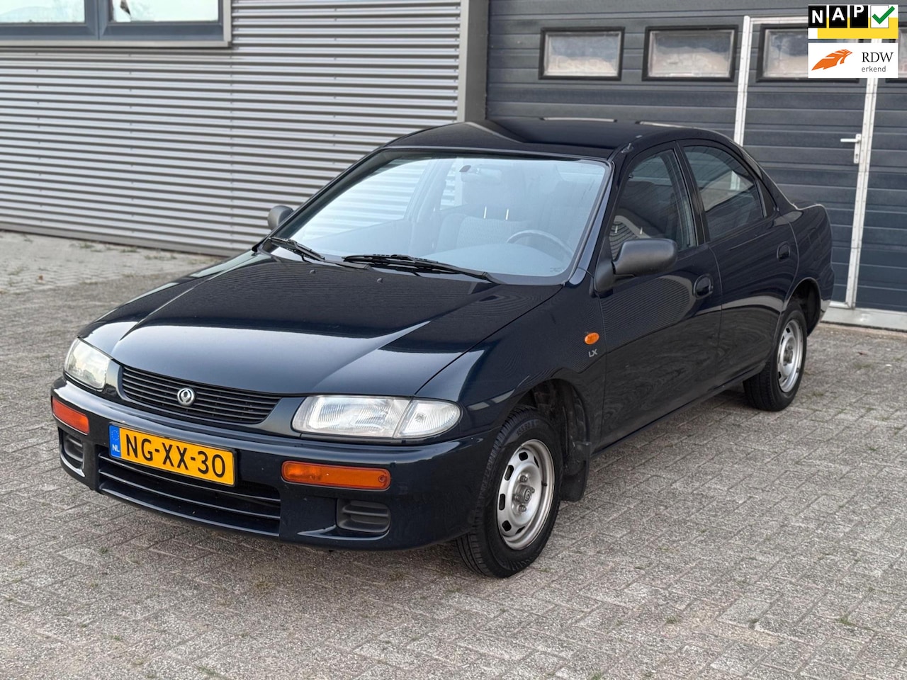 Mazda 323 - 1.3i LX 1STE EIGENAAR - DEALER ONDERHOUDEN - NWE APK!! - AutoWereld.nl