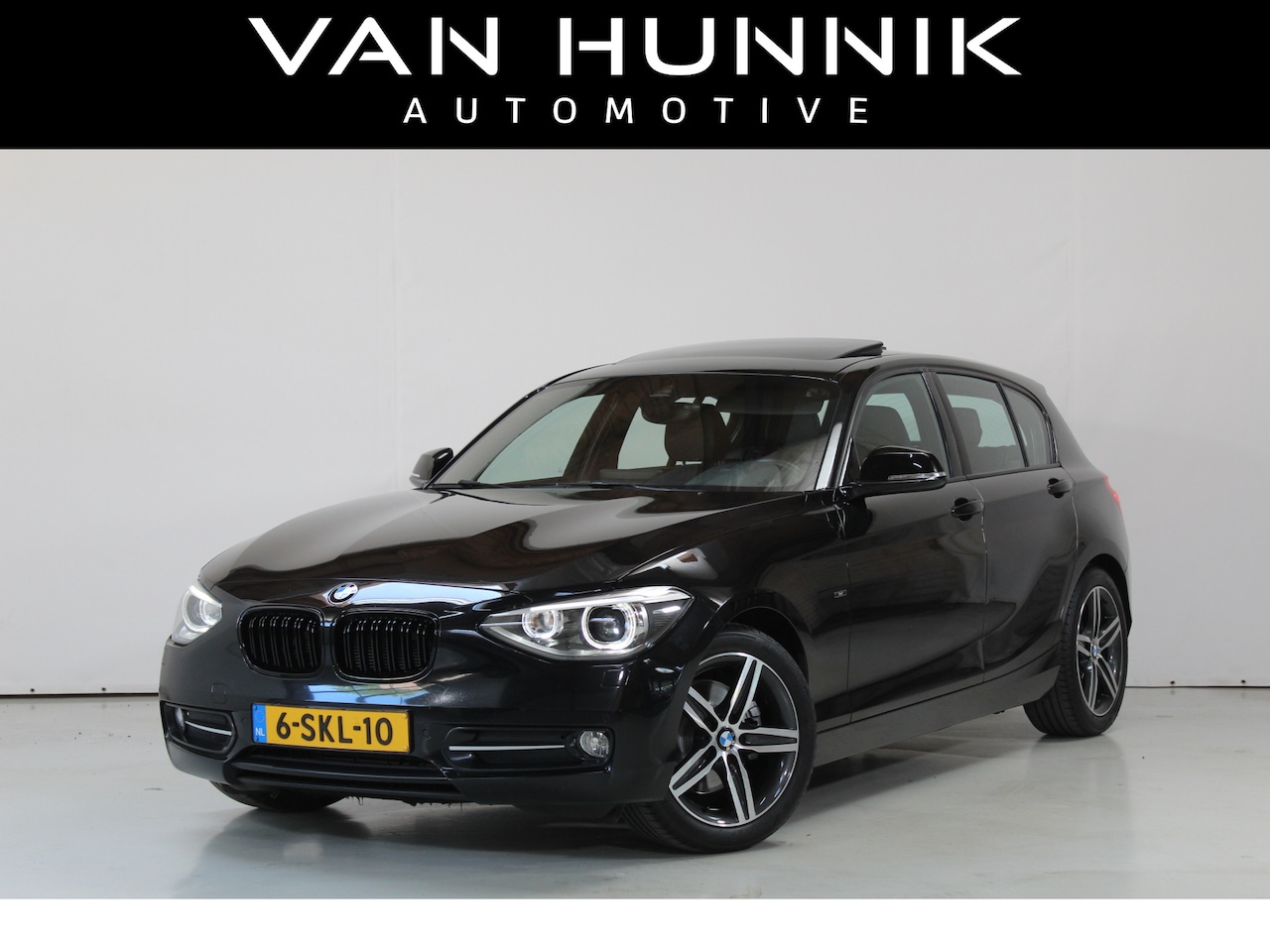 BMW 1-serie - 125i Business Pano | Leder | Harman Kardon - AutoWereld.nl