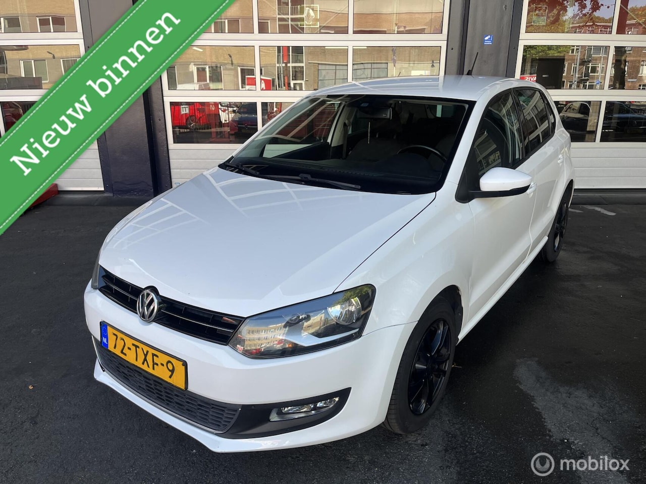 Volkswagen Polo - 1.2 TSI Highline/AUT/NAP/NAVI - AutoWereld.nl