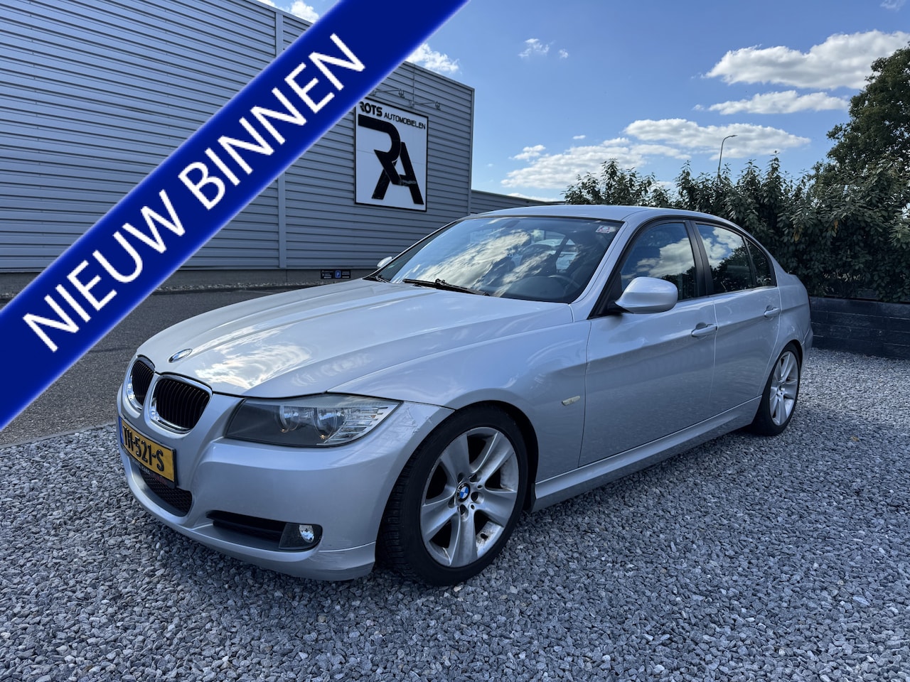 BMW 3-serie - 320i Business Line Clima|Cruis|Media Zilver - AutoWereld.nl