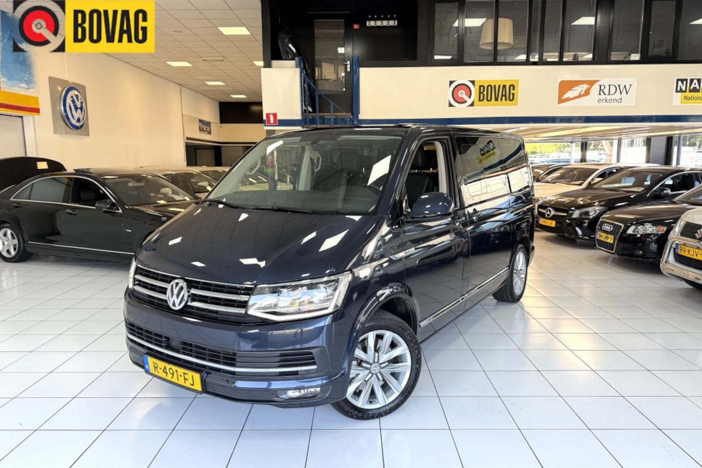 Volkswagen Transporter Multivan - 2.0 TDI L1H1 High.. 7P - AutoWereld.nl