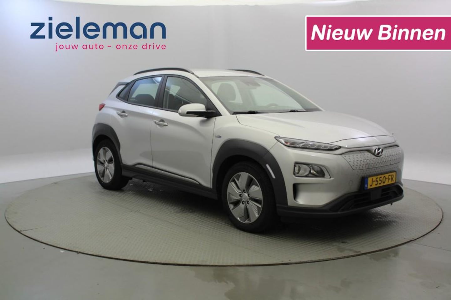 Hyundai Kona Electric - Electric Comfort 64 kWh - Carplay, Camera, Cruise, Trekhaak, SOH 100% - AutoWereld.nl