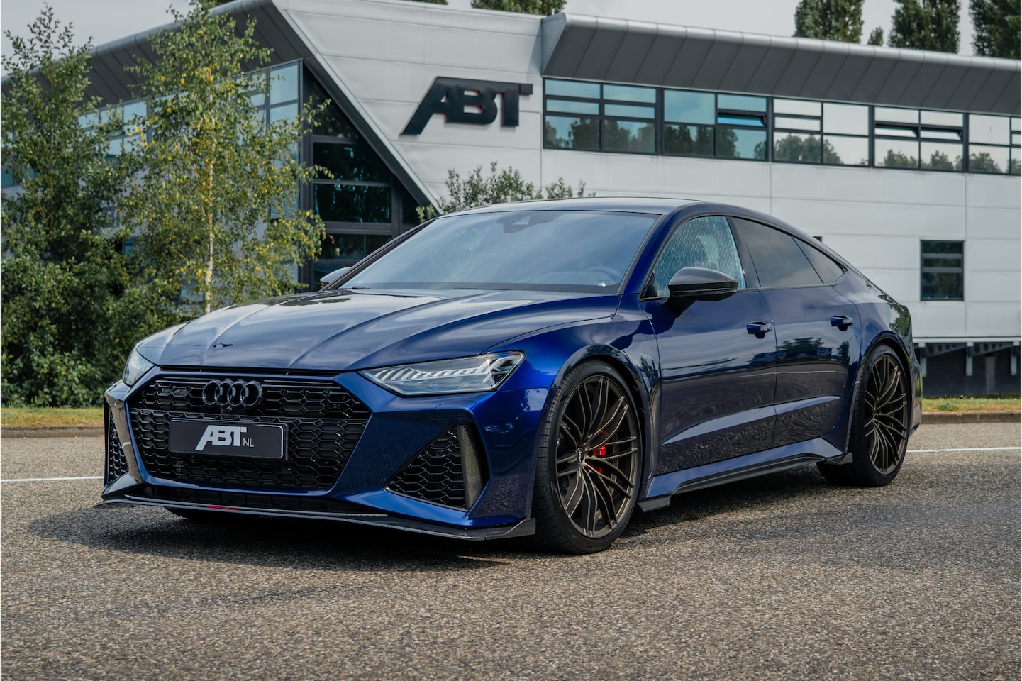 Audi RS7 - Sportback ABT RS7-S | ABT HR22 matt racing gold | Akrapovic | Audi Exclusive | Carbon opti - AutoWereld.nl