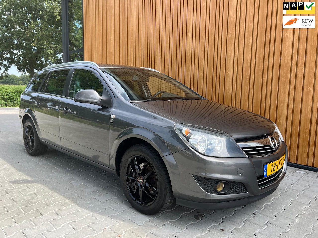 Opel Astra Wagon - 1.6 COSMO + BJ010 + AIRCO + NAVI - AutoWereld.nl