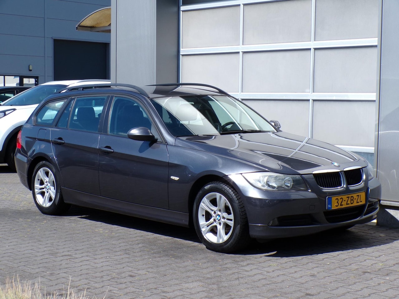 BMW 3-serie Touring - 318i Executive|Cruise|Airco|PDC|Stoelvwr - AutoWereld.nl