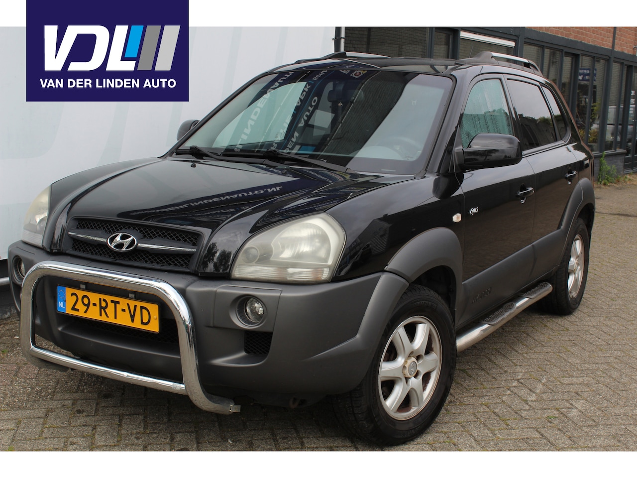 Hyundai Tucson - 2.7i V6 4WD Style Airco I Cruise control I Trekhaak I Elektrische ramen l Stoelverwarming - AutoWereld.nl