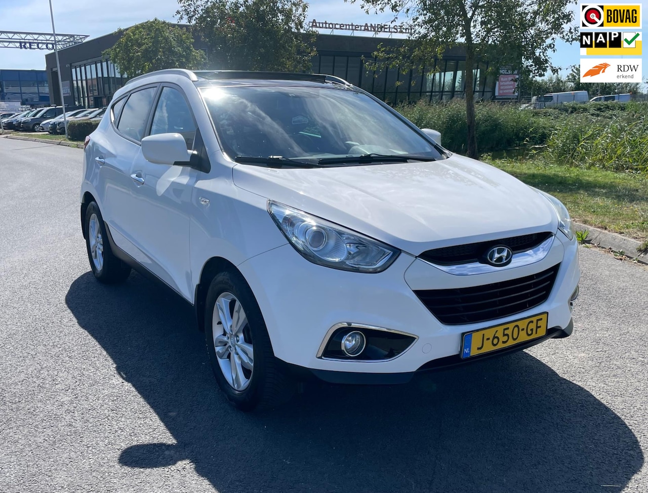 Hyundai ix35 - 2.0i 4WD Style 2.0i 4WD Style, Aut, Pano, Cam, Navi, Stoelverw, Leder, Climate/Cruise, Lmv, Pdc, Goed oh! - AutoWereld.nl