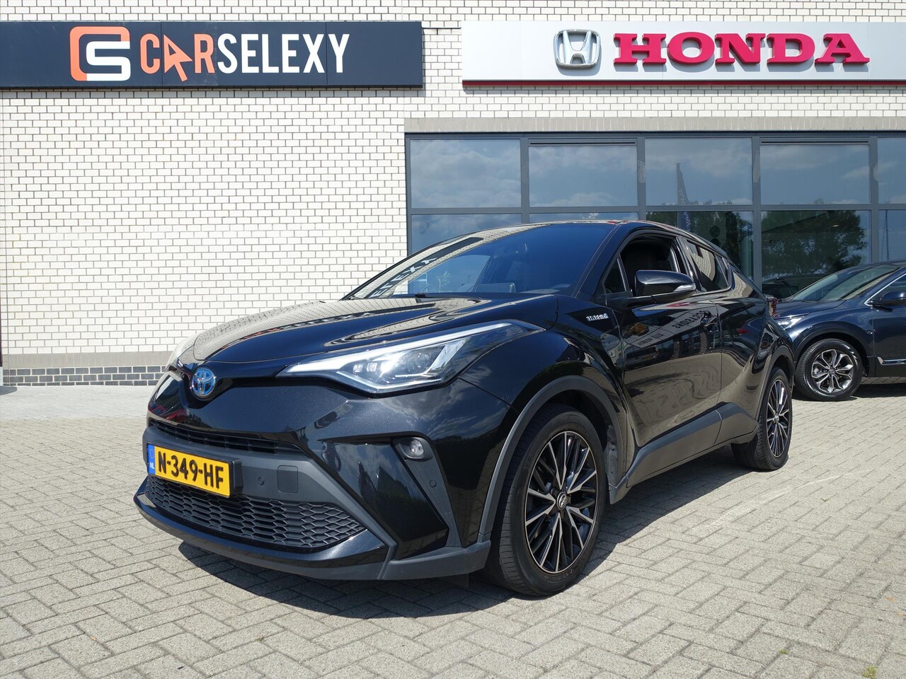 Toyota C-HR - 1.8 Hybrid 122pk CVT Bi-Tone - AutoWereld.nl