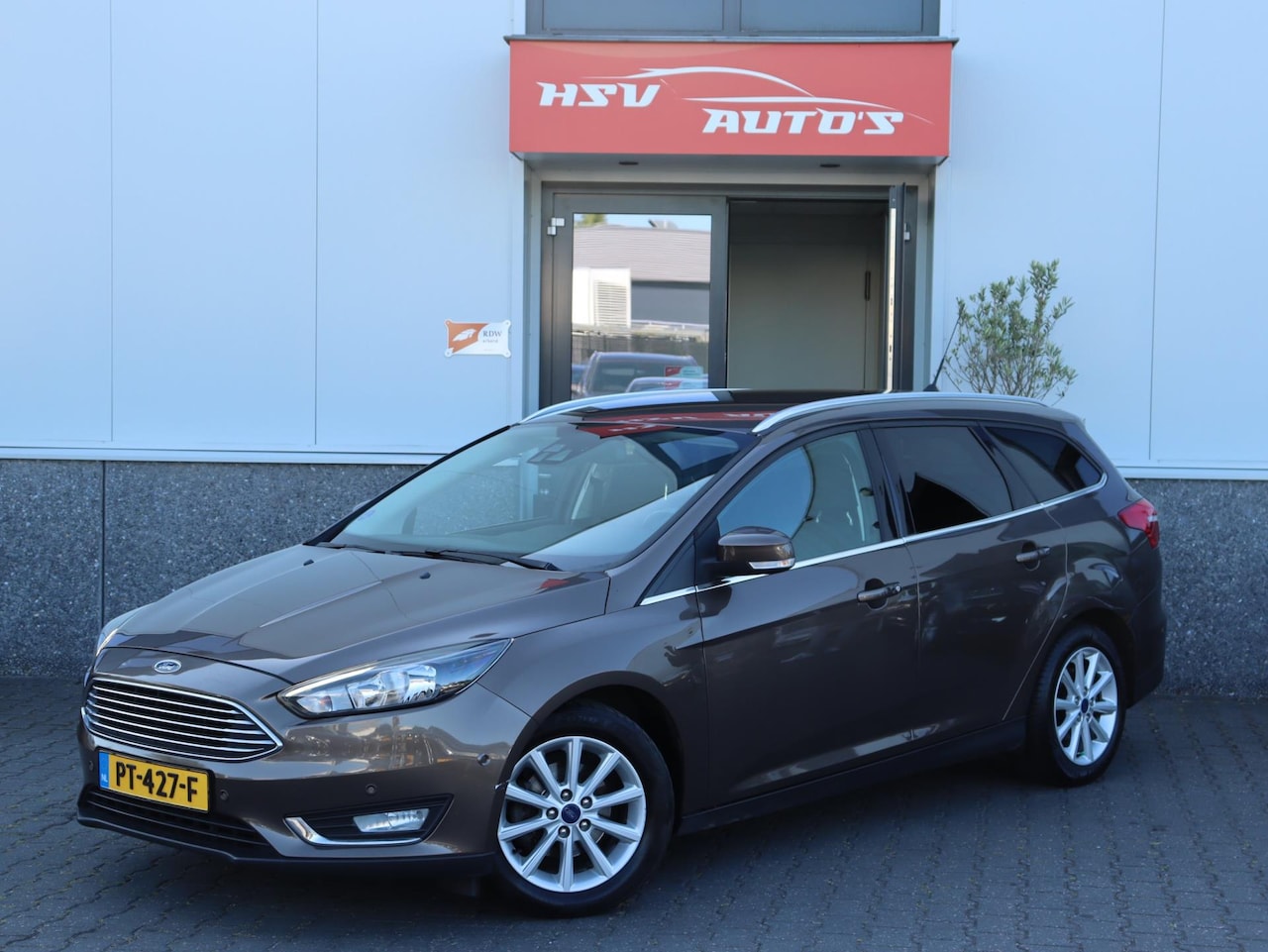 Ford Focus Wagon - 1.0 Titanium navi LM camera - AutoWereld.nl