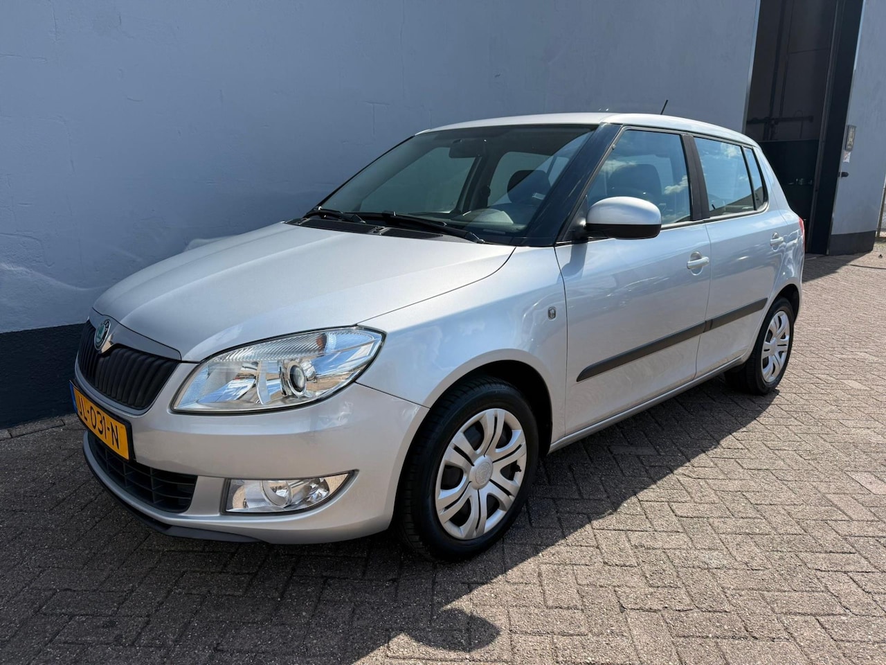 Skoda Fabia - 1.2 Go 5-Deurs - Airco - Trekhaak - AutoWereld.nl