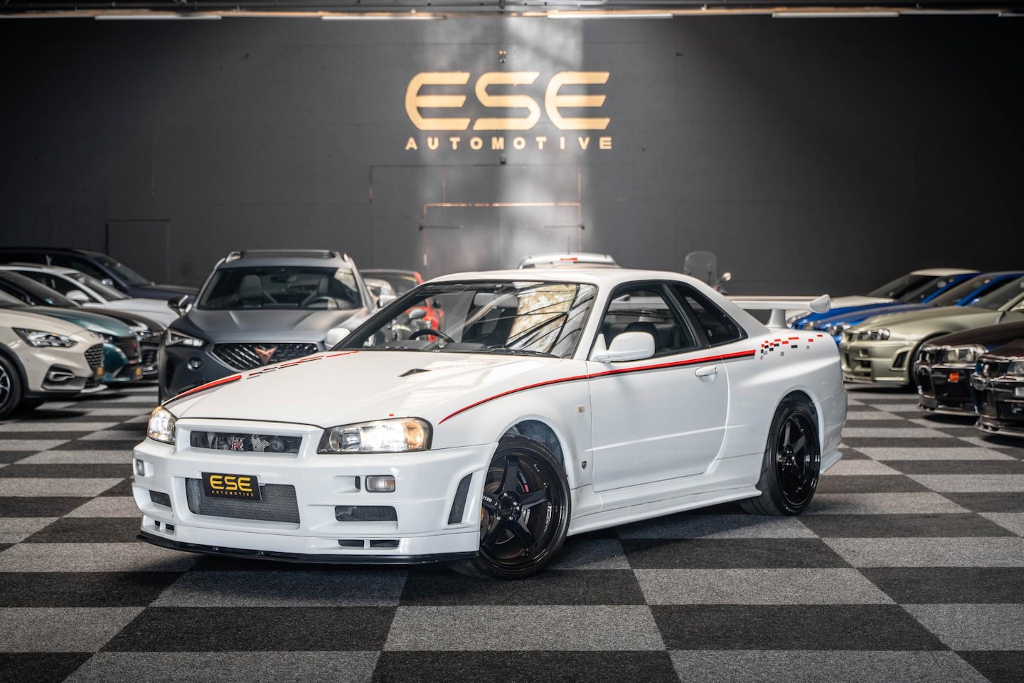 Nissan GT-R - Skyline R34 GTR V-spec II QM1 White - AutoWereld.nl