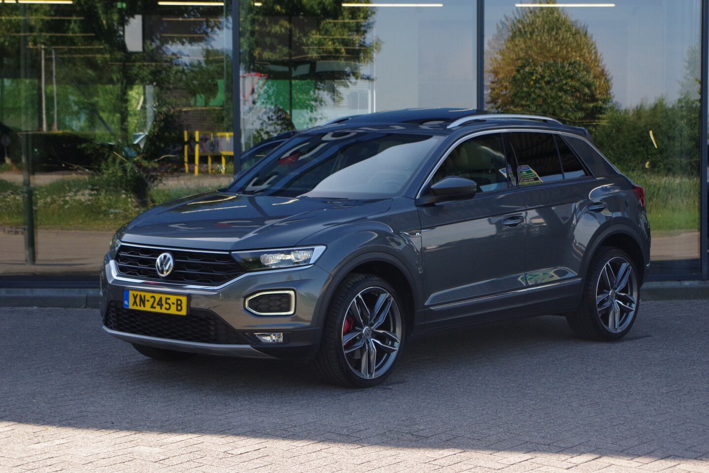 Volkswagen T-Roc - 2.0 TSI 4Motion 190 PK Sport Automaat, *NL-AUTO*, Panoramadak, Winterpakket, Carplay, Came - AutoWereld.nl
