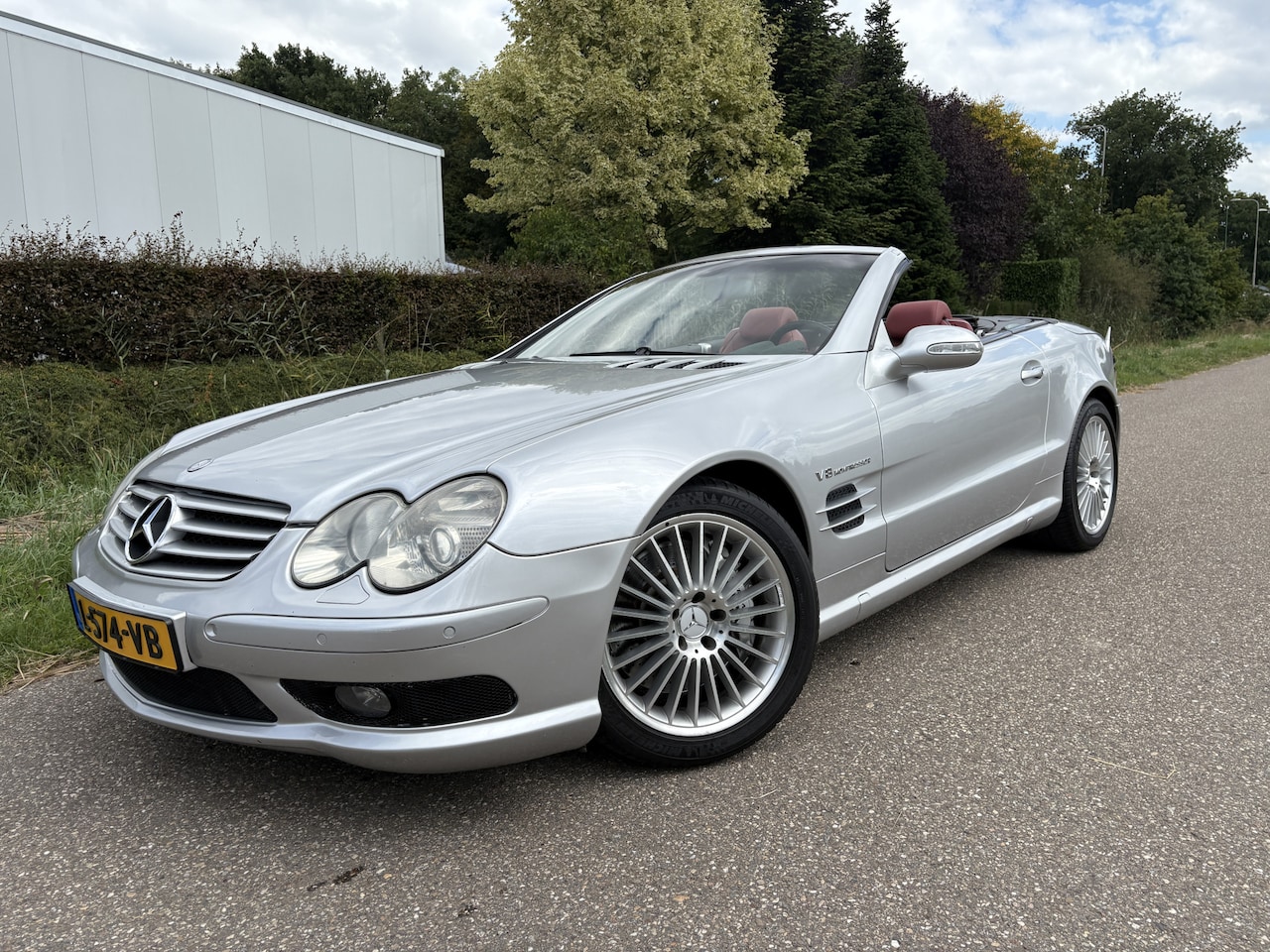 Mercedes-Benz SL-klasse Cabrio - 55 AMG / AUTOMAAT / KEYLESS / BOSE / NAVI - AutoWereld.nl