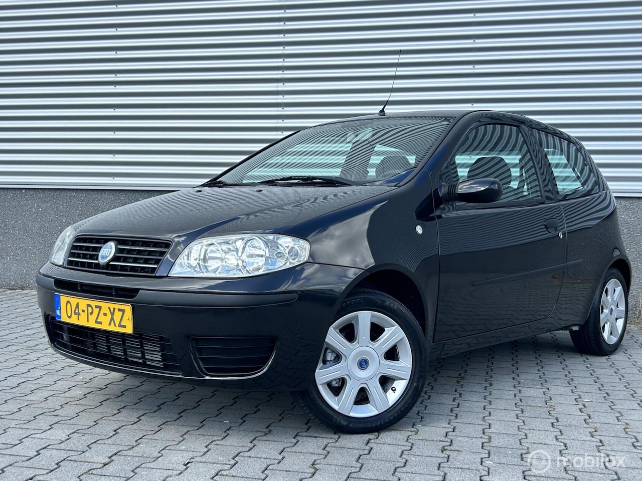 Fiat Punto - 1.4-16V Young lage km stand! - AutoWereld.nl