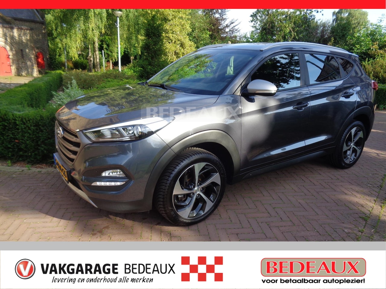 Hyundai Tucson - 1.6 GDi 132pk Comfort bij Vakgarage® prijs rijklaar, met 12 maanden Bovag garantie. - AutoWereld.nl