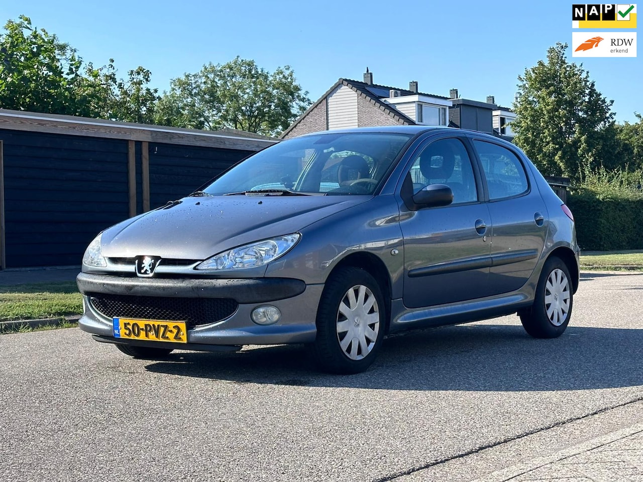 Peugeot 206 - 1.4 Génération 5DR*Airco*136.000*APK*Elektrische ramen* - AutoWereld.nl
