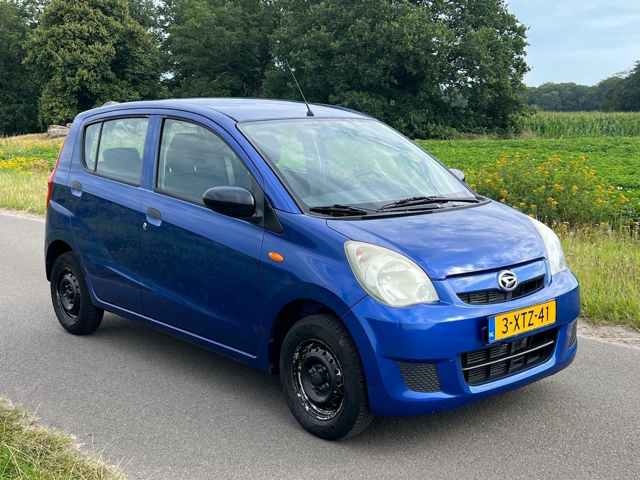 Daihatsu Cuore - 1.0 Premium 5 deurs! - AutoWereld.nl
