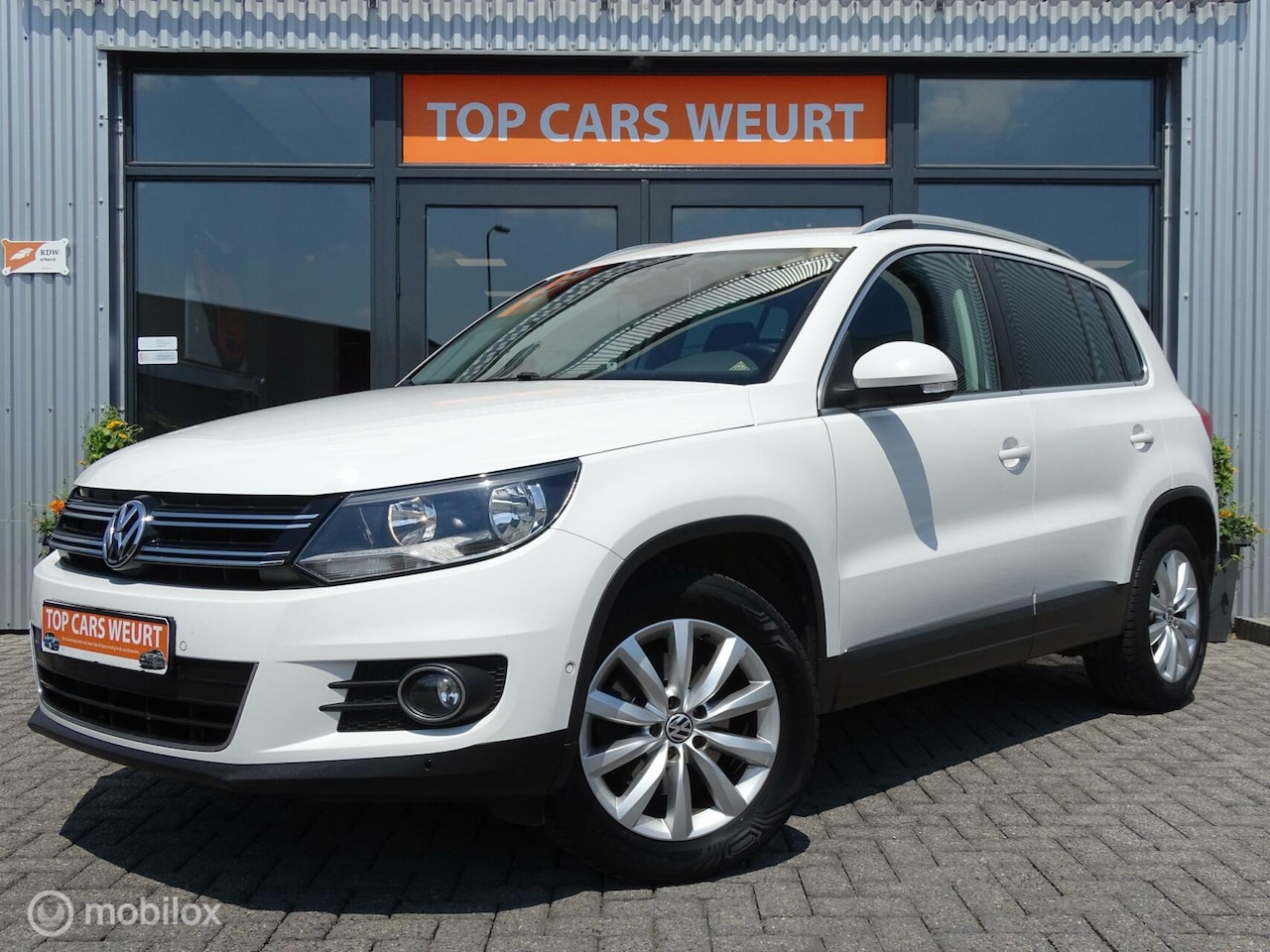 Volkswagen Tiguan - 1.4 TSI Sport&Style NAVI/CRUISE/ALCANTARA/TOP OCCASION - AutoWereld.nl