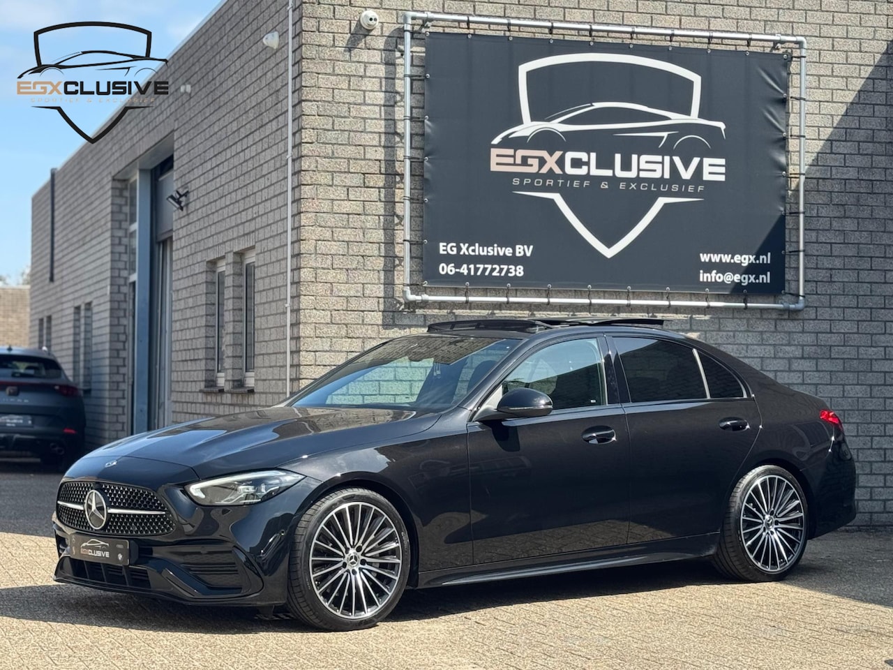 Mercedes-Benz C-klasse - 180 AMG Line Pano/Ambiente/Camera - AutoWereld.nl