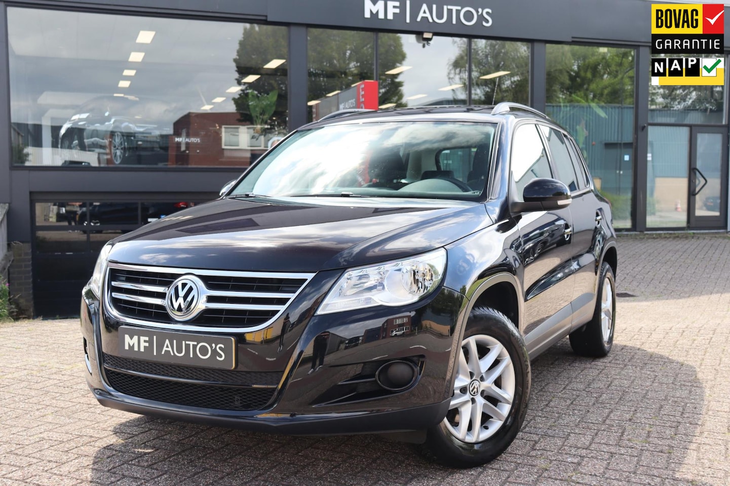 Volkswagen Tiguan - 1.4 TSI 150PK Comfort&Design|Pano|Clima|Cruise|NL Auto NAP - AutoWereld.nl