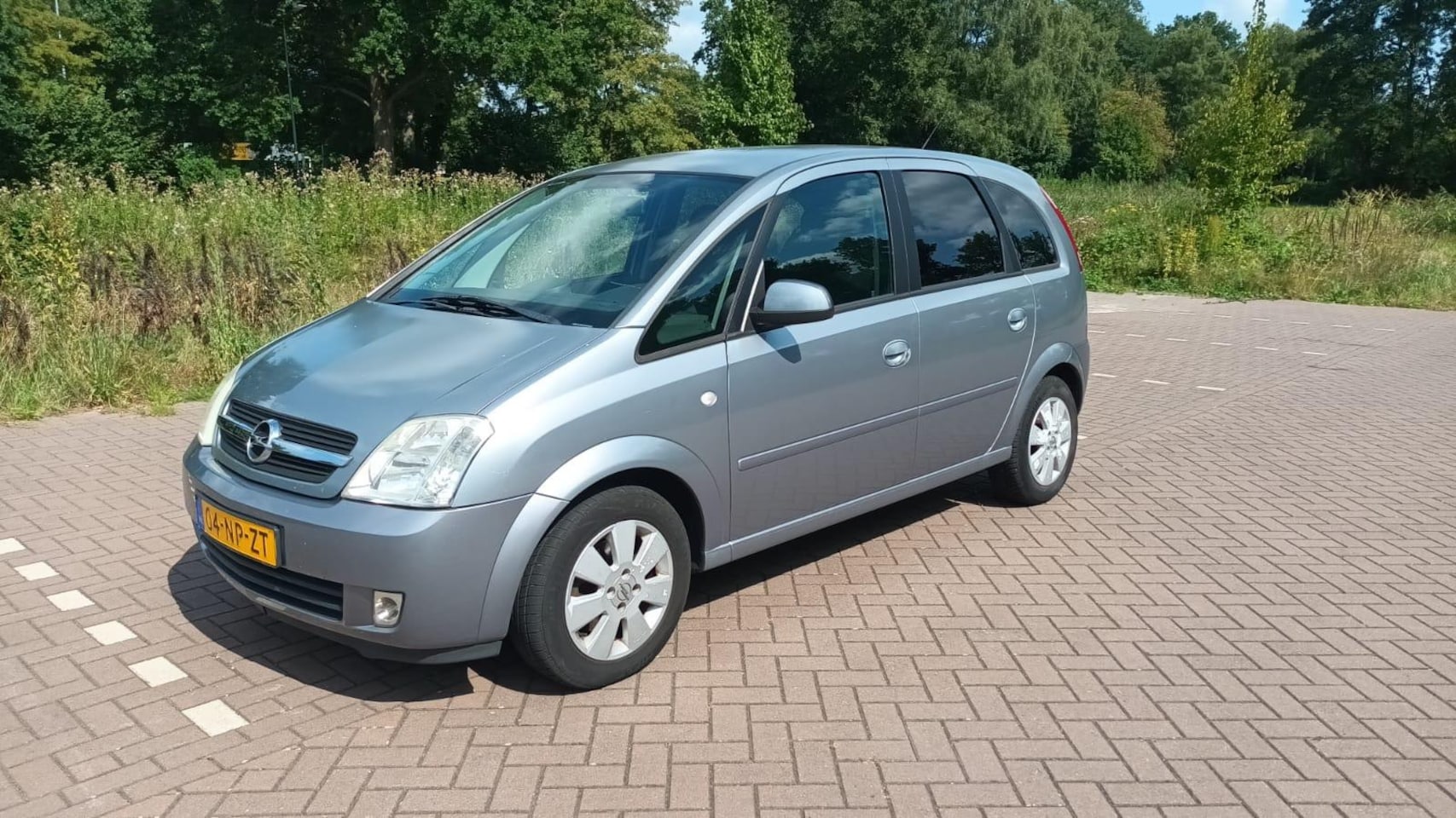 Opel Meriva - 1.6 Cosmo airco, cruise,elektr ramen - AutoWereld.nl
