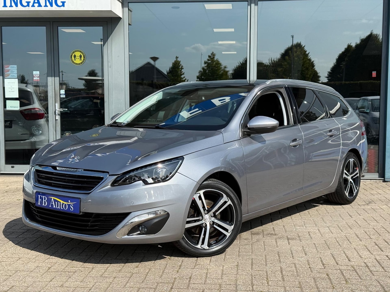Peugeot 308 SW - 1.2 PureTech Blue Lease Premium Airco Lmv Navi - AutoWereld.nl