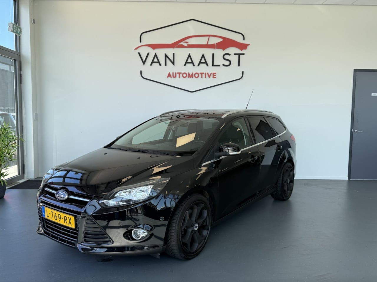 Ford Focus Wagon - 1.6 EcoB. Titanium / Navi/ Trekhaak/ Clima/ Cruise/ PDC - AutoWereld.nl