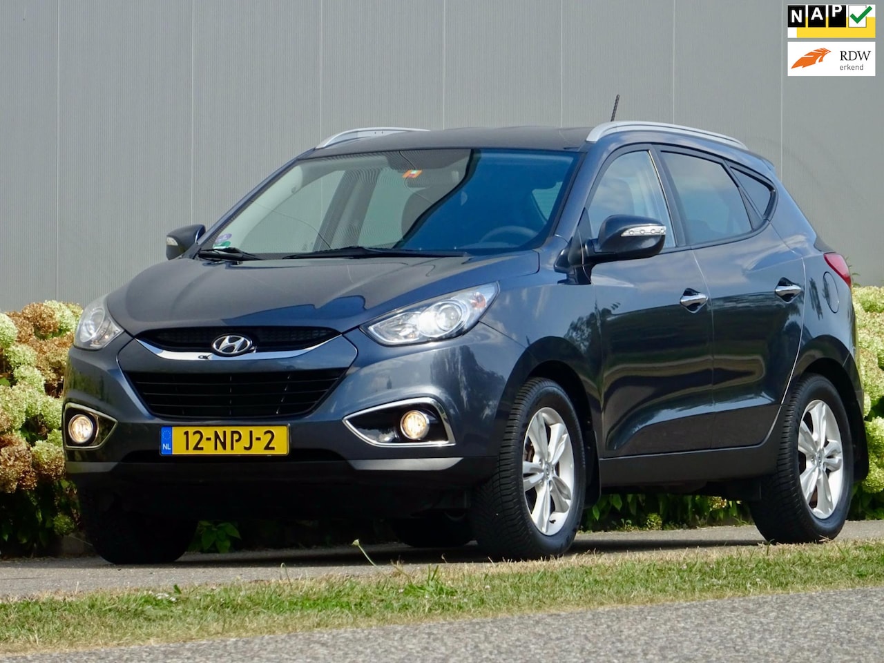 Hyundai ix35 - 2.0i AUT Style Sport NL / Navi 1/2-Leer Trekhaak - AutoWereld.nl