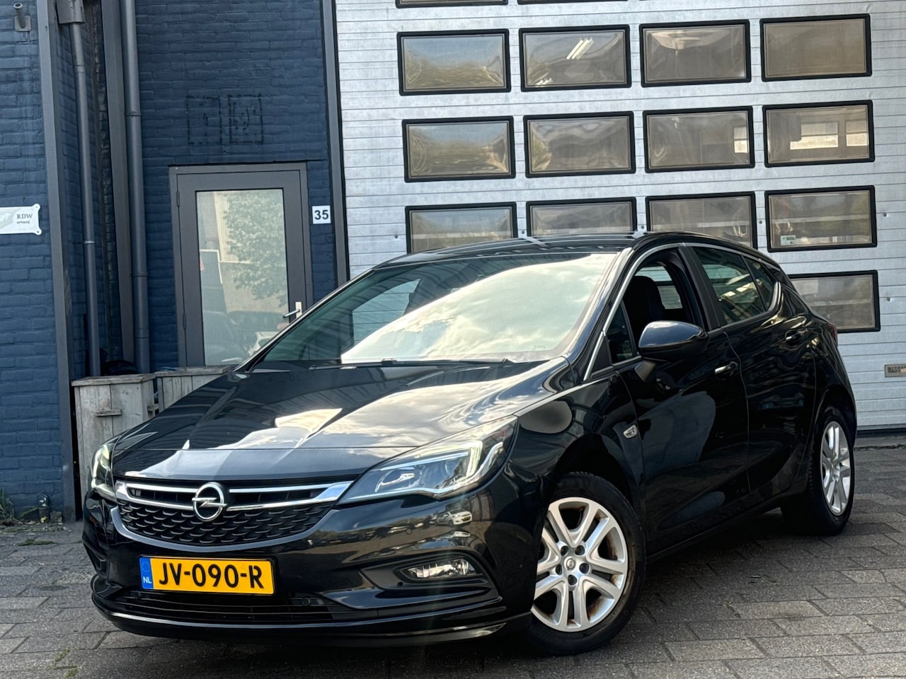 Opel Astra - 1.0 Business+ | Clima | Cruise | Navi | PDC V+A - AutoWereld.nl