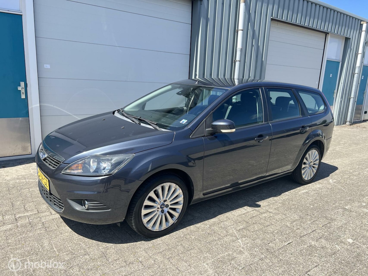 Ford Focus Wagon - 1.8 Ghia Flexi Fuel 1.8 Ghia Flexi Fuel - AutoWereld.nl