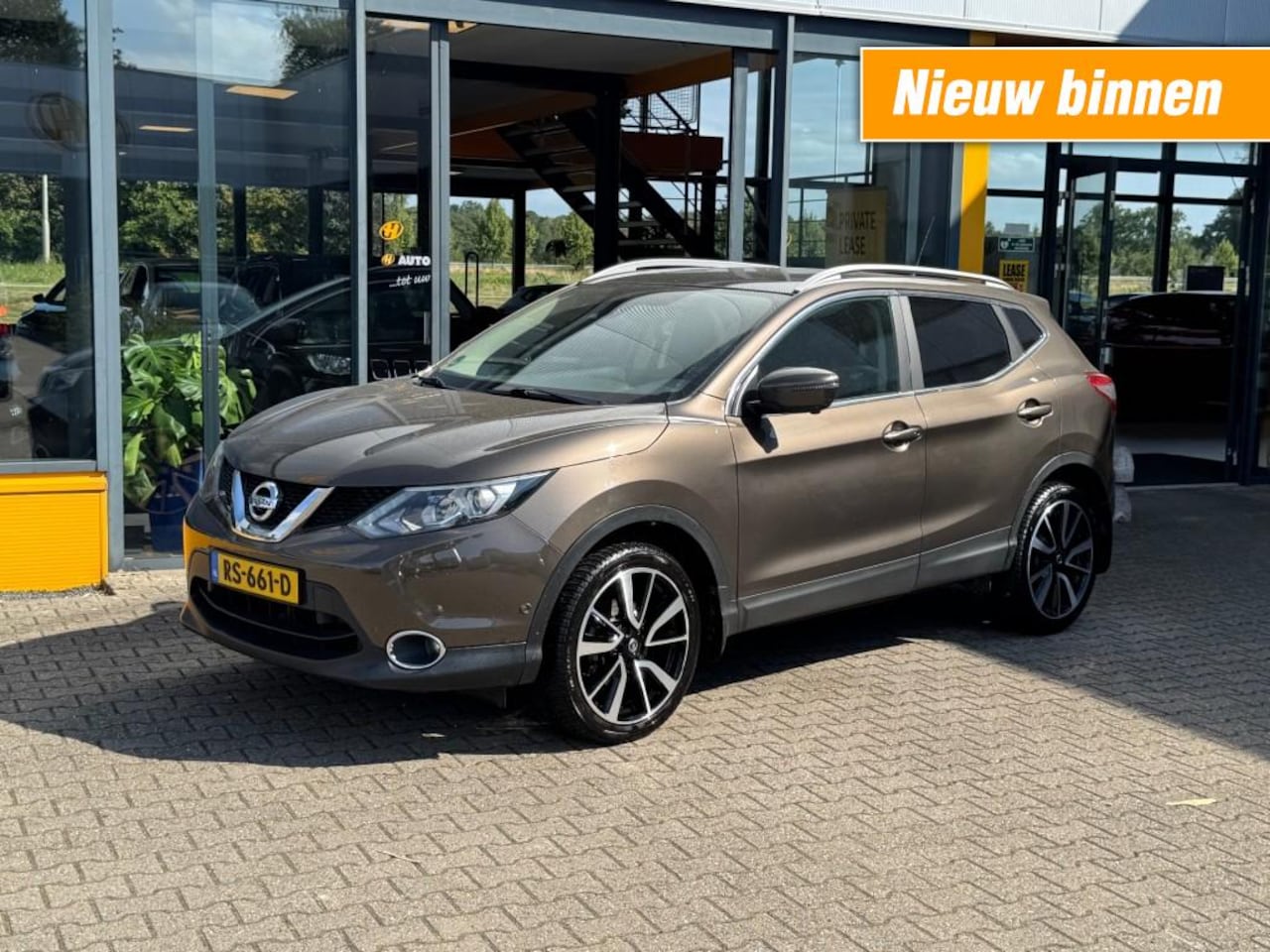 Nissan Qashqai - 1.2 Tekna - Pan. dak - Navi - camera - AutoWereld.nl