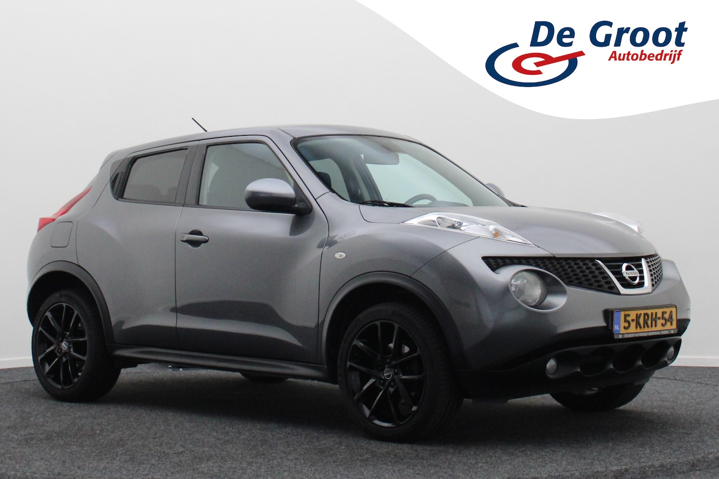 Nissan Juke - 1.6 Acenta Climate, Cruise, AUX/USB, Bluetooth, Getint Glas, 18” - AutoWereld.nl