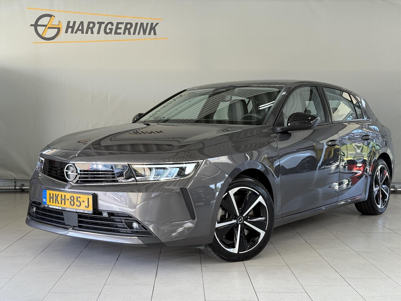 Opel Astra - 1.6 Hybrid 180pk Business Edition Automaat* Airco / Navi / Cruise / PDC / LMV - AutoWereld.nl