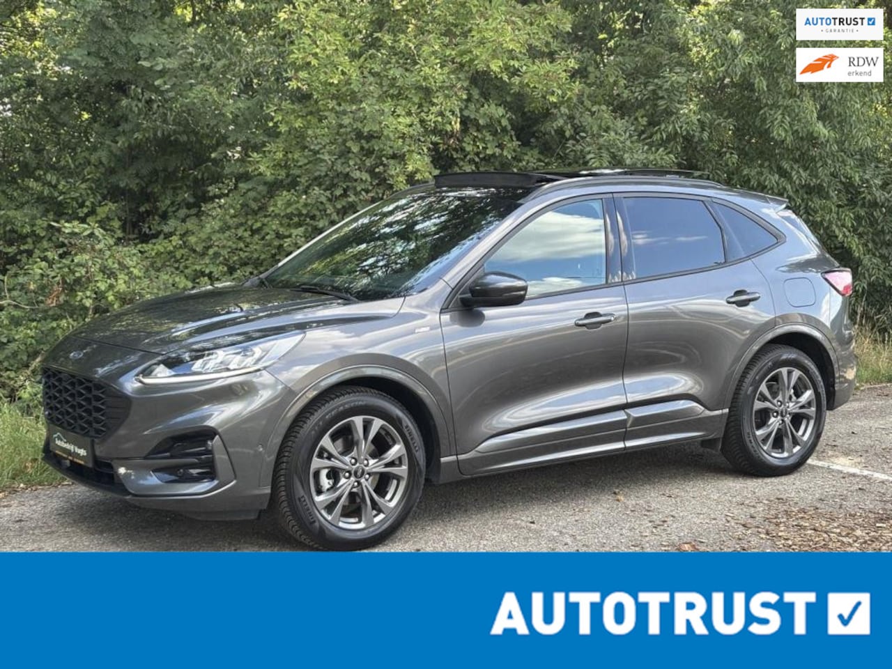 Ford Kuga - 2.5 FHEV ST-Line *GEEN STEKKER*Panorama*ACC - AutoWereld.nl