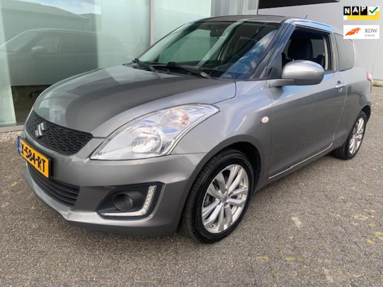 Suzuki Swift - 1.2 Exclusive EASSS AIRCO BJ 8-2015 APK 1-2026 - AutoWereld.nl