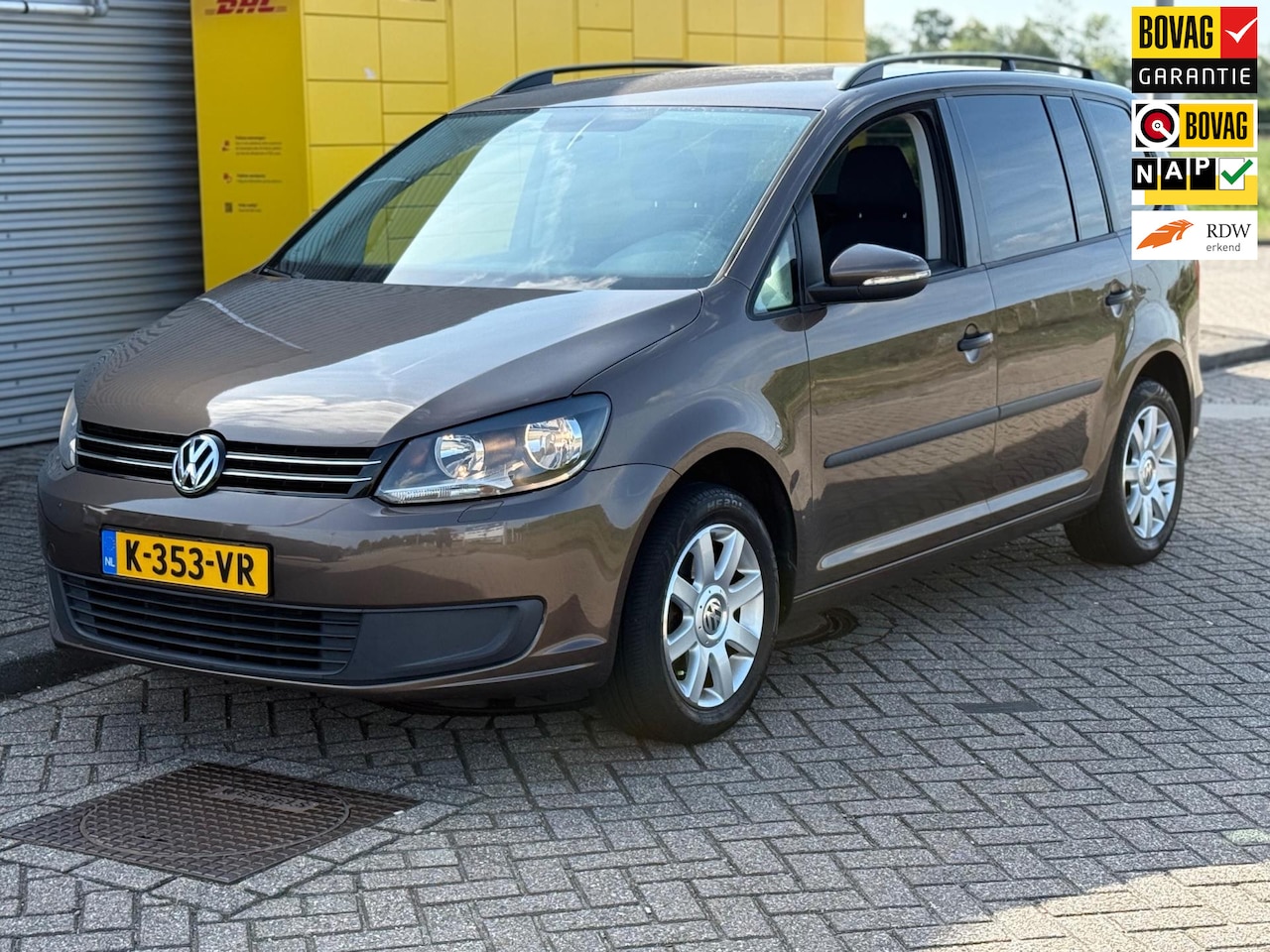 Volkswagen Touran - 1.2 TSI Bluemotion 7p.Bj 2012 Bruin ECC Airco PDC stoelverw - AutoWereld.nl
