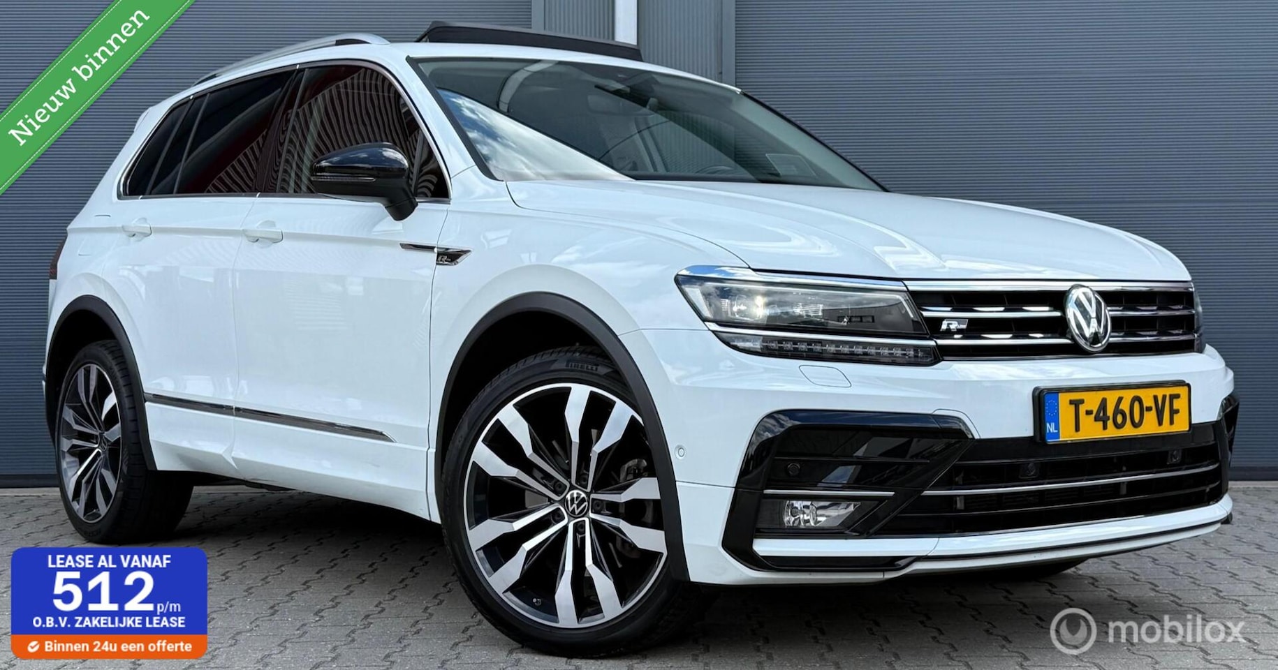 Volkswagen Tiguan - 2.0 TSI 4M. 220PK R-Line Pano.dak/Trekhaak/20" - AutoWereld.nl