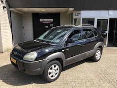 Hyundai Tucson - 2.7i V6 4WD Style / AUTOMAAT / ALU / CLIMA / LEDER / TREKHAAK