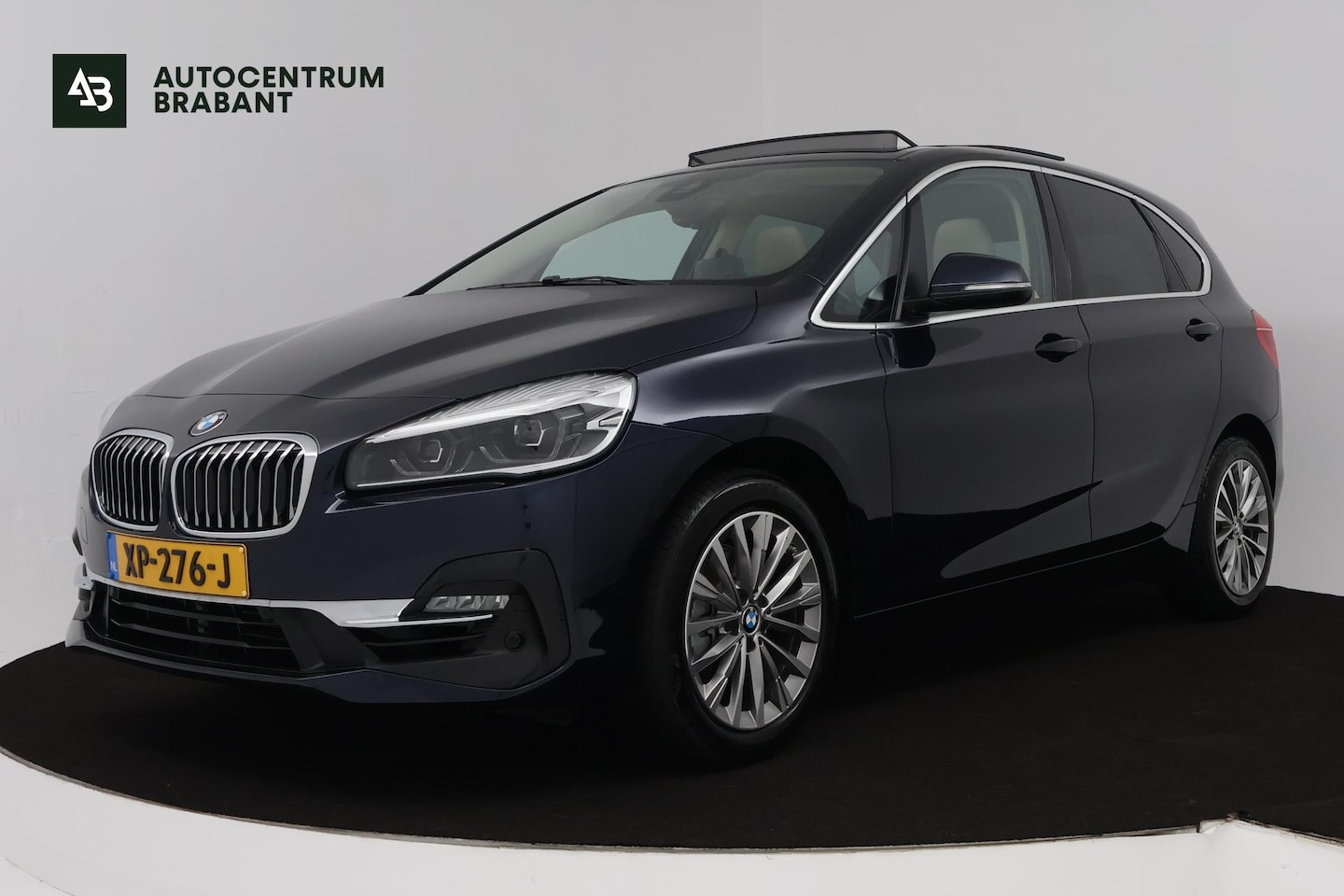 BMW 2-serie Active Tourer - 218i High Executive Edition (PANORAMADAK, ACHTERUITRIJCAMERA, STOELVERWARMING, ADAPTIVE CR - AutoWereld.nl