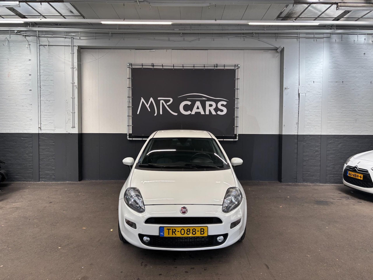 Fiat Punto Evo - 0.9 TwinAir Sempre Airco/Navi/cruise Control - AutoWereld.nl