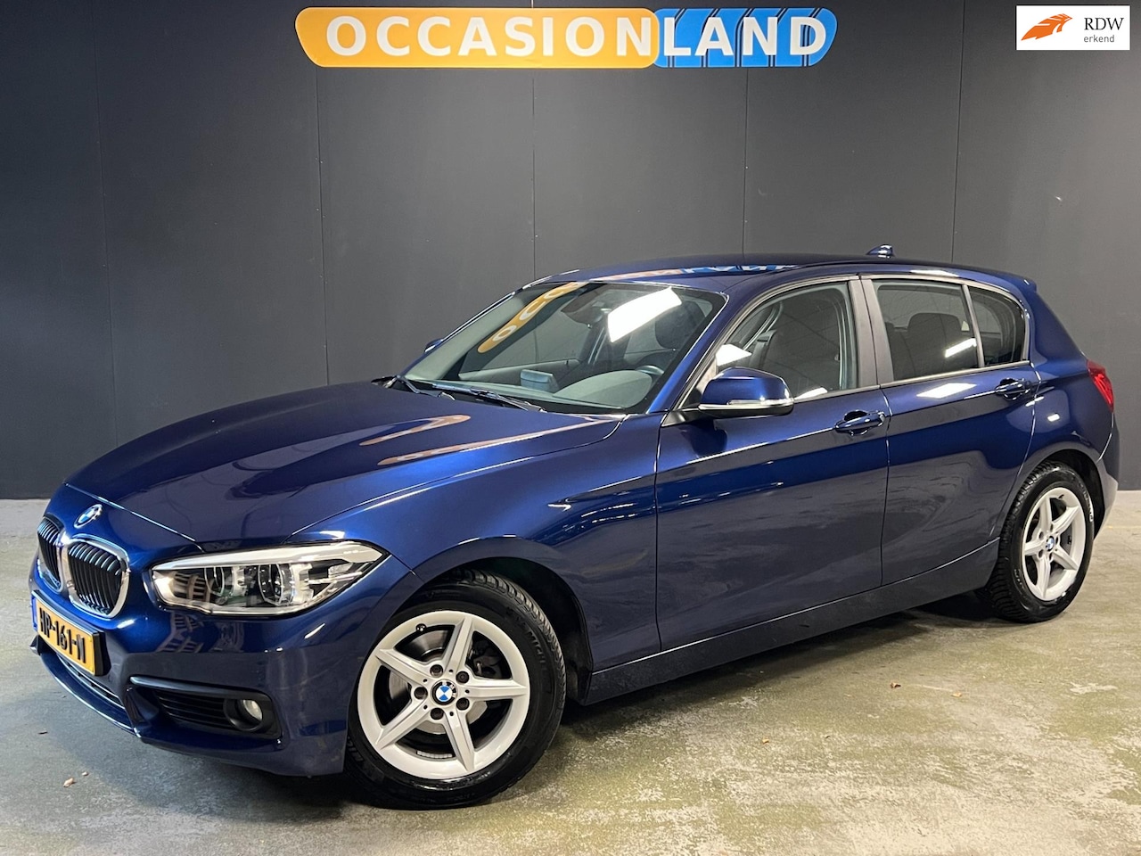 BMW 1-serie - 118i EDE Corporate Lease Essential AUT|LED|NAV|SPORTSTOEL| - AutoWereld.nl