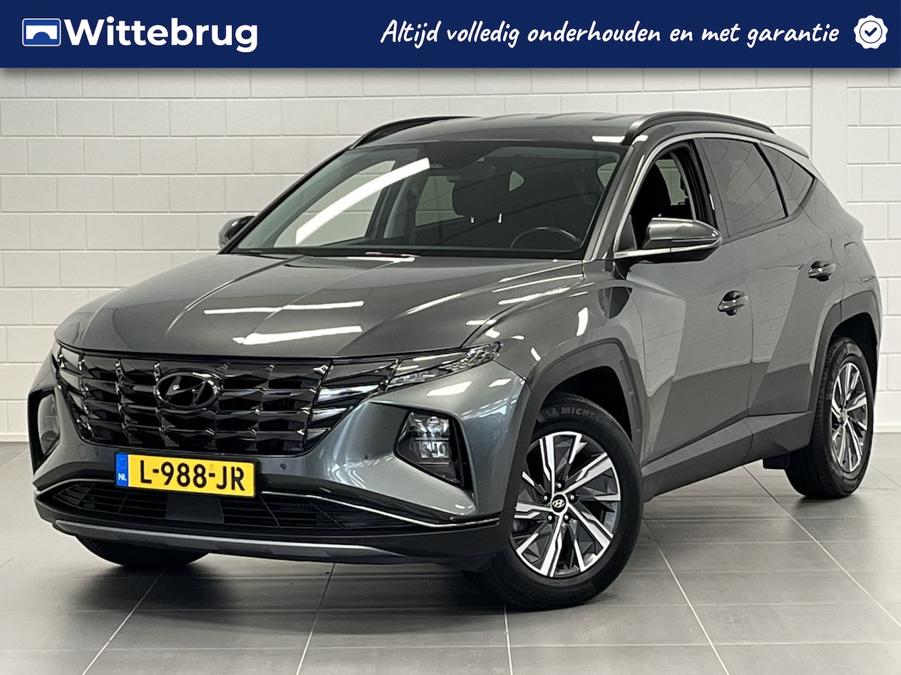 Hyundai Tucson - 1.6 T-GDI HEV Comfort Smart NAVIGATIE | STOEL + STUURWIELVERWARMING | AUTOMATISCHE ACHTERK - AutoWereld.nl