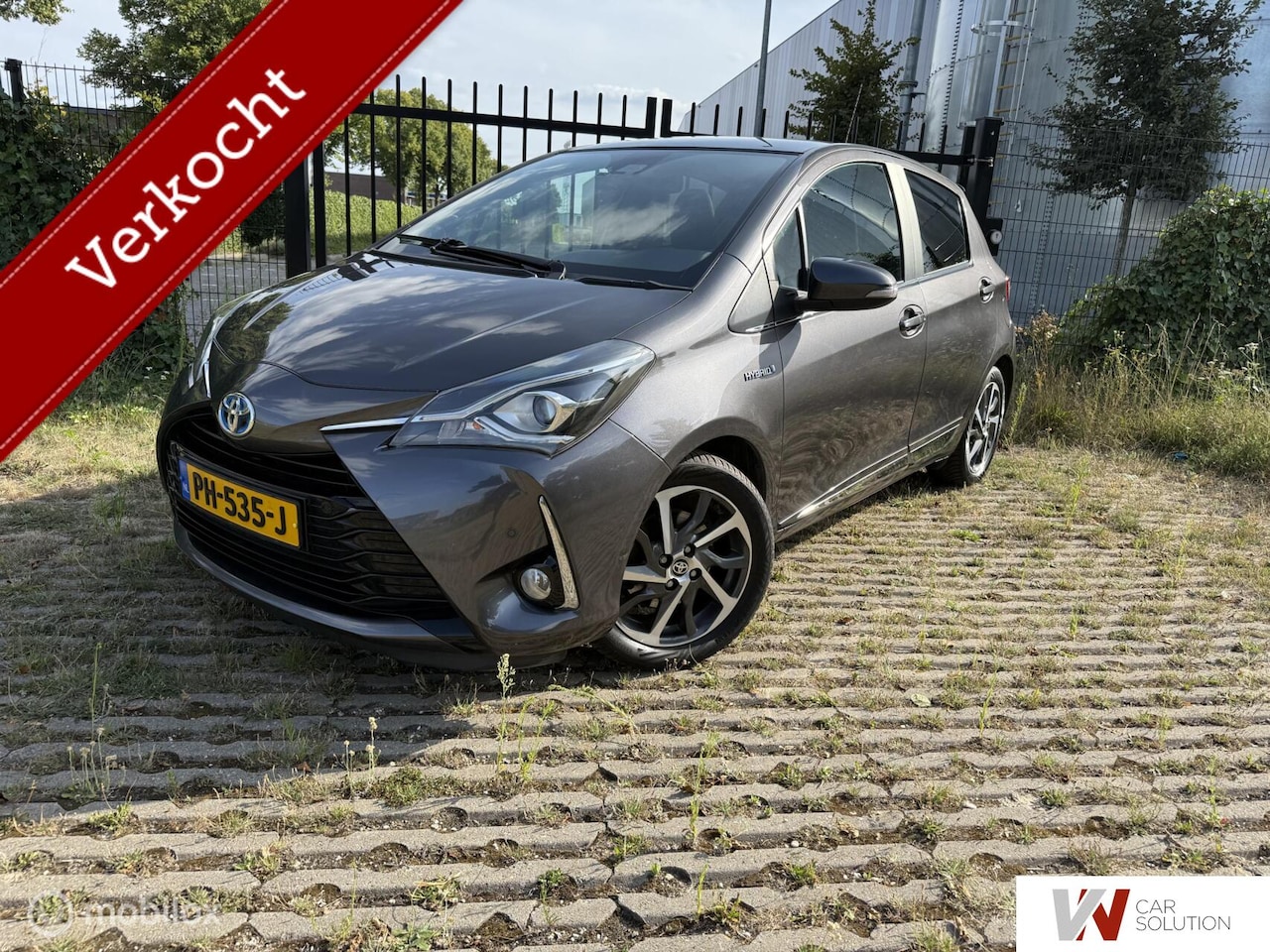 Toyota Yaris - 1.5 Hybrid SPORT PANO NAVI CAM PDC CRUISE CLIMA - AutoWereld.nl