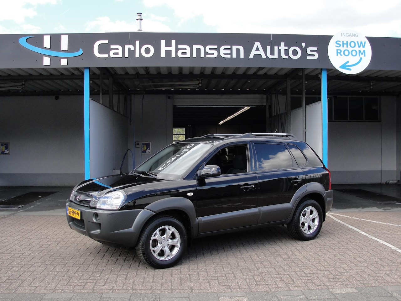 Hyundai Tucson - 2.0i Dynamic Executive 2.0i Dynamic Executive - AutoWereld.nl