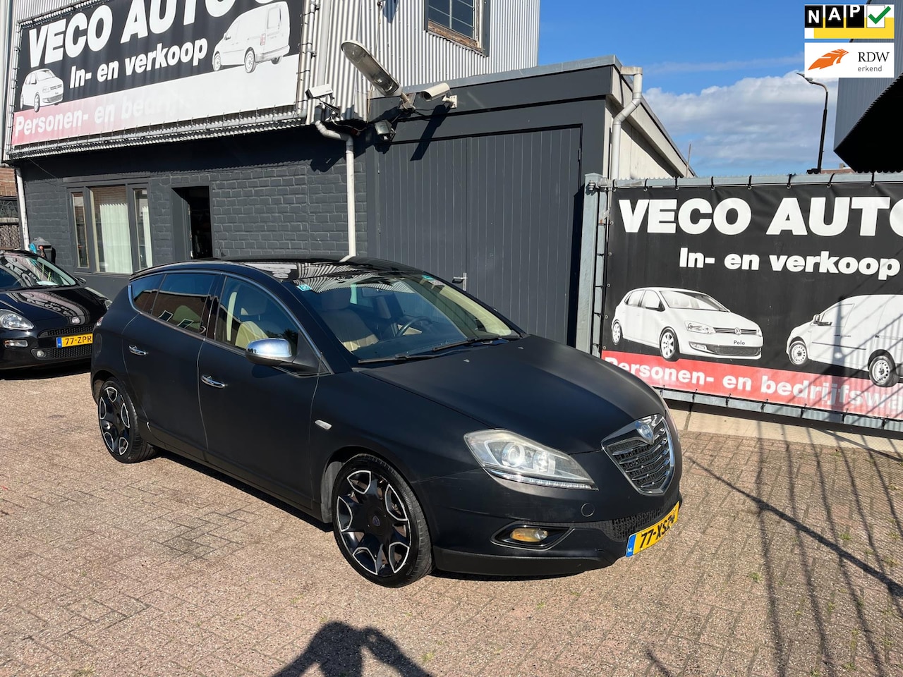 Lancia Delta - 1.4 M.air Lounge nieuwe apk ecc airco leer - AutoWereld.nl